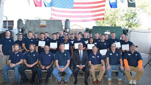 The most recent Workshops for Warriors graduating class The program has a 100 job placement rate