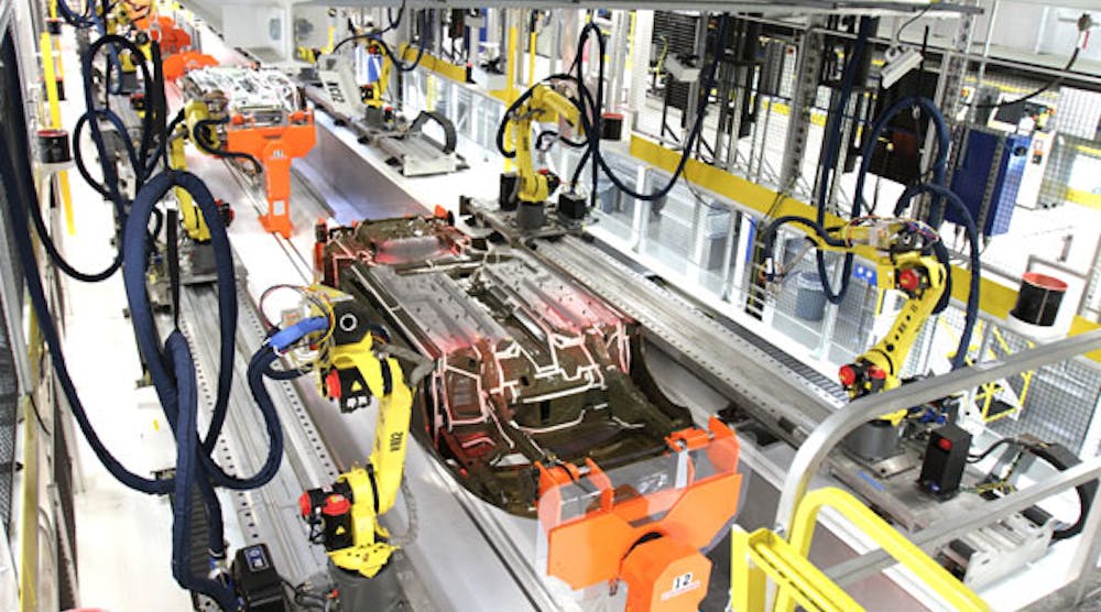 Robots work on the underbody sealing of a 2015 Chrysler 200 inside the paint shop at Chrysler Group&apos;s Sterling Heights, Mich., assembly plant. Slated for closure in 2010, the plant was transformed in a nearly $1 billion investment involving a new paint shop, body shop and retooled assembly line. Photo: CHRYSLER