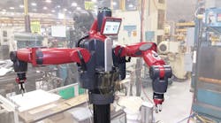 A Rethink Robotics Baxter cooperative robot works on the floor at Standby Screw in suburban Cleveland. The robot hasn&apos;t replaced any workers, but it has shifted some to new positions.