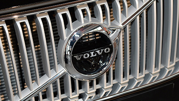 The Volvo logo on a car grille