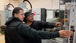 Patricio Siaca, left, and Geneo Brown graduated from MCC&rsquo;s accelerated tooling program in 2015 and became the first in their families to earn a college credential