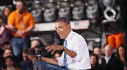 President Barack Obama speaks at a General Electric gas engines plant in Waukesha, Wisc., in January 2014. During his 2012 re-election campaign, Obama pledged to create 1 million new American manufacturing jobs during his second term. With a year to go, the number stands around 370,000.