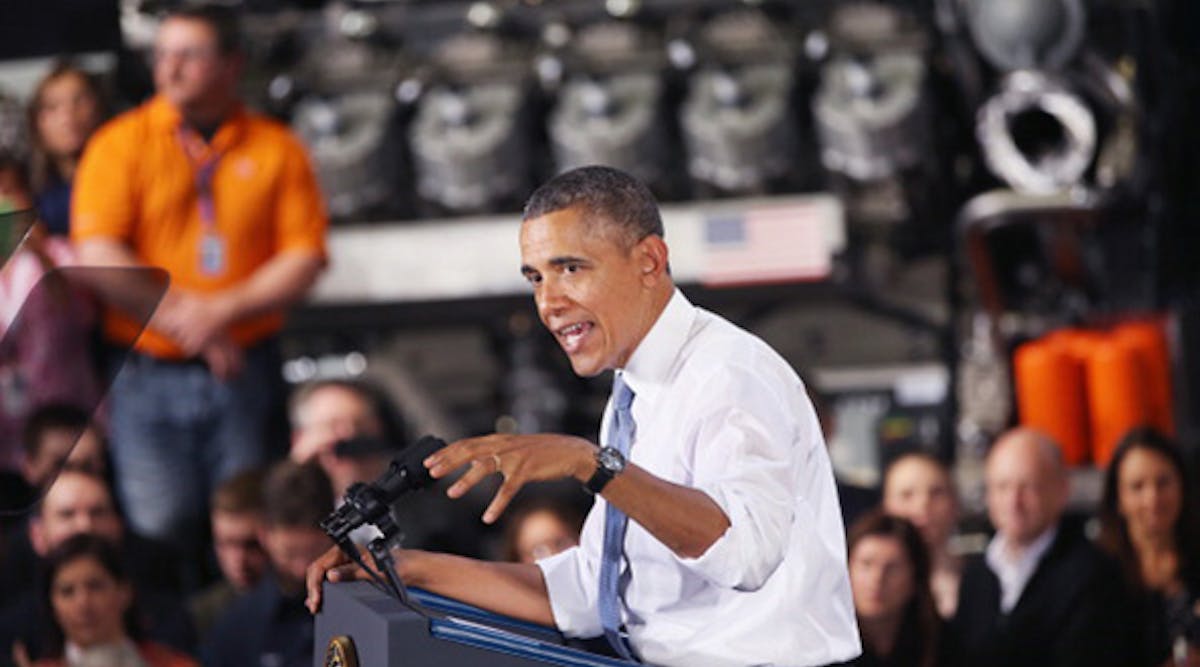 President Barack Obama speaks at a General Electric gas engines plant in Waukesha, Wisc., in January 2014. During his 2012 re-election campaign, Obama pledged to create 1 million new American manufacturing jobs during his second term. With a year to go, the number stands around 370,000.