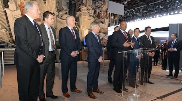Transportation Secretary Anthony Foxx, center, flanked by executives from Ford, GM, FCA, Google, Honda, and Volvo.