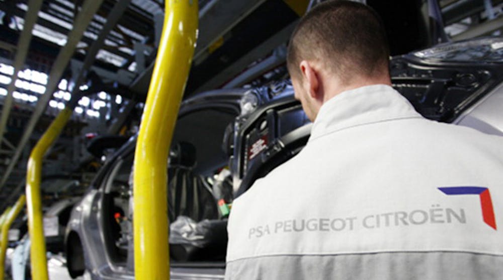 Workers assemble Peugeot SUVs at the PSA Peugeot Citroen assembly plant in Mulhouse, France. Industrial production in the country dropped 1.6% in December, its biggest monthly drop in almost two years.