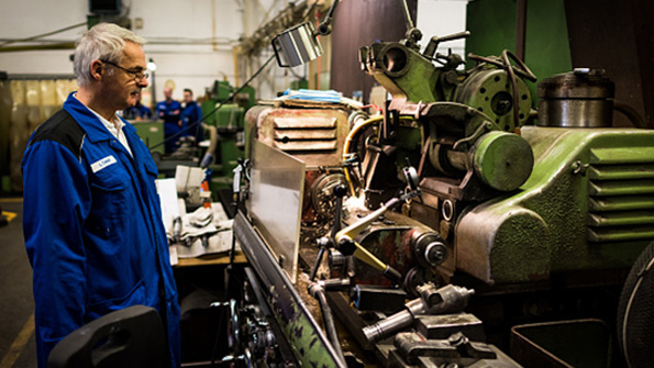 A German worker mans his station at the W Eubel GmbH machine manufacturer