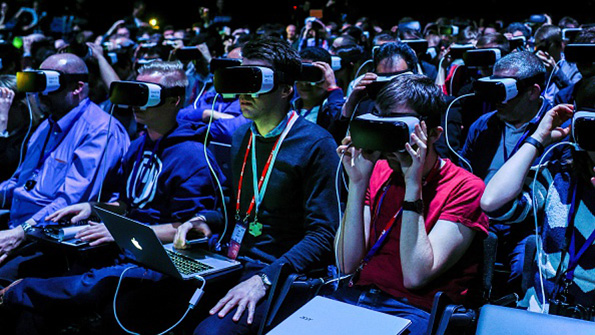 Mobile World Congress attendees use the new Samsung Gear VR headsets