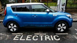 An electric Go Ultra Low Kia Soul EV at a London charging station An electric Go Ultra Low Kia Soul EV at a London charging station