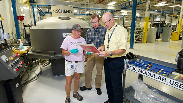 Pratt amp Whitney North Berwick Parts Center employees Wilma Bean Jeff Rice and Steve Mongiat collaborate on design processes an important element in the plant39s competitive success