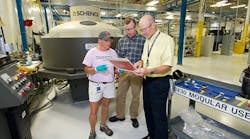 Pratt &amp; Whitney North Berwick Parts Center employees Wilma Bean, Jeff Rice and Steve Mongiat collaborate on design processes, an important element in the plant&apos;s competitive success.