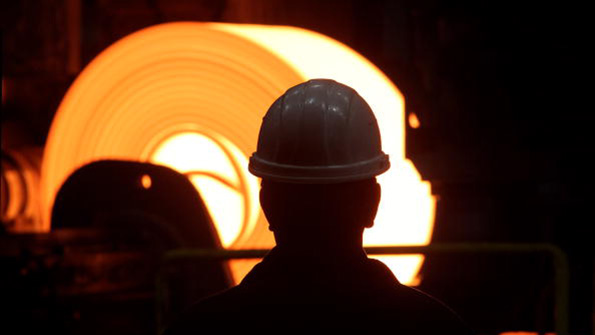 A German steelworker at an ArcelorMittal plant