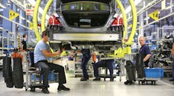 Mercedes-Benz workers assemble S-Class sedans at the company&rsquo;s plant in Sindelfingen, Germany.