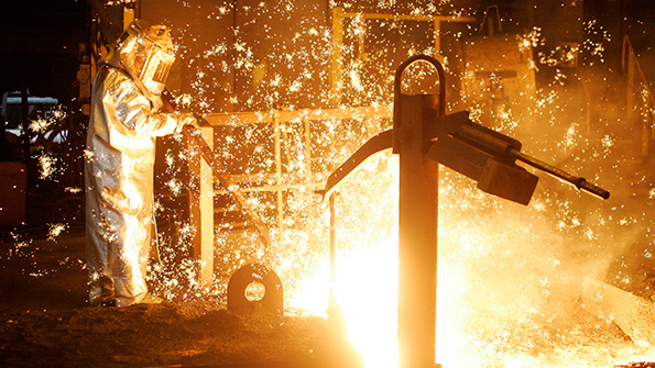 A blast furnace at a US Steel plant being tapped