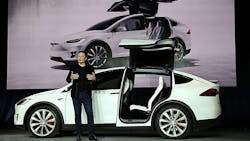 Tesla CEO Elon Musk introduces the Model X at a 2015 event Tesla CEO Elon Musk introduces the Model X at a 2015 event