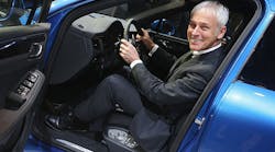Volkswagen AG CEO Matthias Mueller in happier times, as the head of Porsche back in 2014.