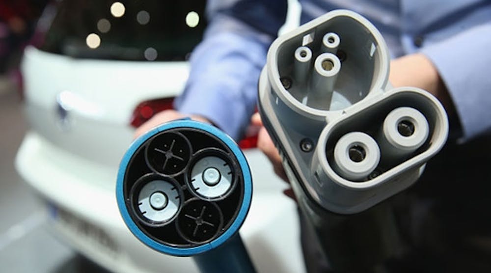 Two different kinds of electric car charging plug interfaces -- the left one more common in Japan and the right one more common in Germany