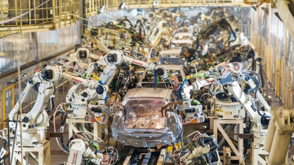 Toyota Sees First Profit Drop in Five Years on Yen Strength