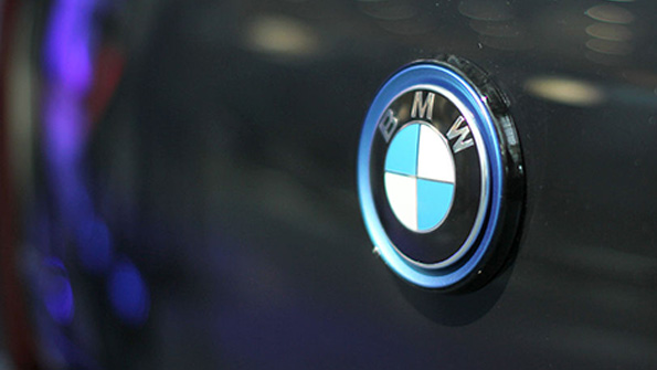 A BMW logo on an i3 electric car