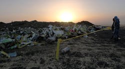 Debris lays piled up at the crash site of Ethiopian Airlines flight ET302 a day after the Boeing Max 8 jet went down in Bishoftu, Ethiopia.