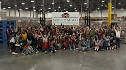 Nehemiah&rsquo;s employees and their families at the company&rsquo;s 2018 Christmas party.