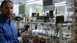 Ioannis Ieropoulos with urine powered phone Ioannis Ieropoulos with urine powered phone