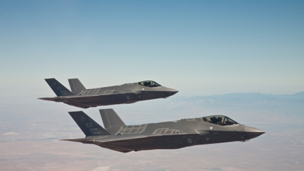 Lockheed Martin F35A test aircraft AF6 and AF7 fly in formation on a test mission over Edwards Air Force Base Calif