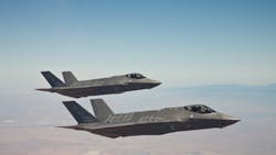 Lockheed Martin F35A test aircraft AF6 and AF7 fly in formation on a test mission over Edwards Air Force Base Calif Lockheed Martin F35A test aircraft AF6 and AF7 fly in formation on a test mission over Edwards Air Force Base Calif