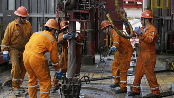 Mexican President Signs Law Opening Oil Industry