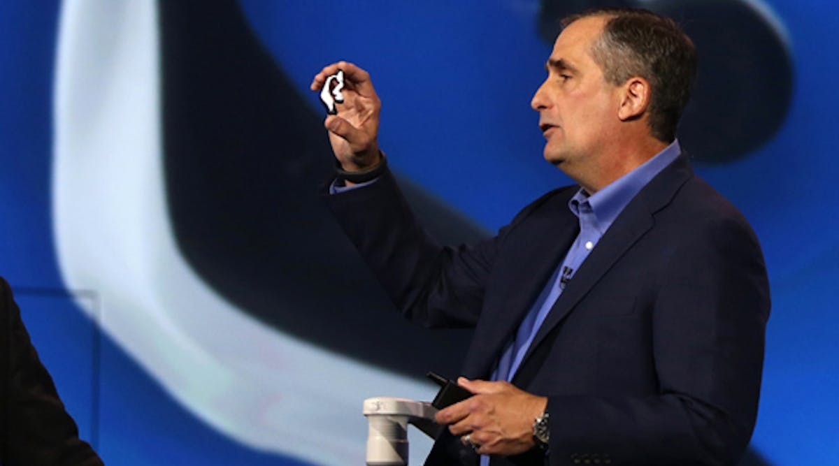 Intel CEO, Brian Krzanich, shows off Intel&apos;s new smart headset and earbud, which monitors heart rate and pulse while you listen.