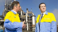 UK finance minister George Osborne, right, talks with Tata Steel Europe CEO Karl Koehler during a visit to Tata Steel&apos;s plant in Port Talbot, Wales, in March 2014. Tata&apos;s Port Talbot factory, the largest steel plant in the UK, produces 5 million tons of steel annually and employs over 4,000 people. (Photo by Matthew Horwood - WPA Pool/Getty Images)