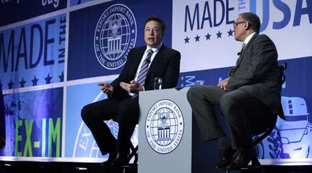 SpaceX CEO Elon Musk, left, and Export-Import Bank President Fred Hochberg speak at the 2014 annual conference of the Export-Import Bank in Washington on April 25. The two-day event focused on the global business environment and prospects for growth. (Photo by Alex Wong/Getty Images)