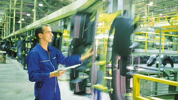 Factory growth cooled off in the last month of the second quarter increasing 01