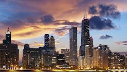 A night view of Chicagos skyline with the Hancock Building to the right A night view of Chicagos skyline with the Hancock Building to the right