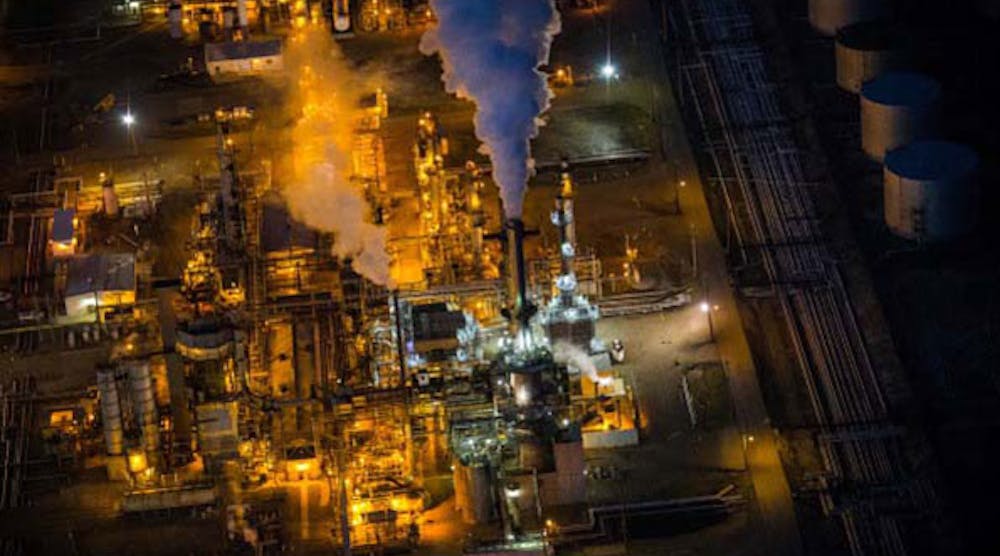 A gas and oil refinery is seen in an aerial view in the early morning hours of July 30, 2013 in Bismarck, North Dakota. Oil prices in New York today fell to their lowest level since March due to refinery shutdowns. (Photo by Andrew Burton/Getty Images)