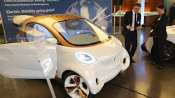 Smart electric car at conference Smart electric car at conference