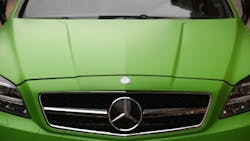Green MercedesBenz vehicle Green MercedesBenz vehicle