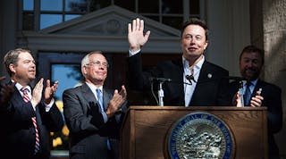 Elon Musk, CEO of Tesla Motors, speaks at a press conference at the Nevada State Capitol, September 4, 2014 in Carson City, Nevada. Copyright Max Whittaker Collection: Getty Images News