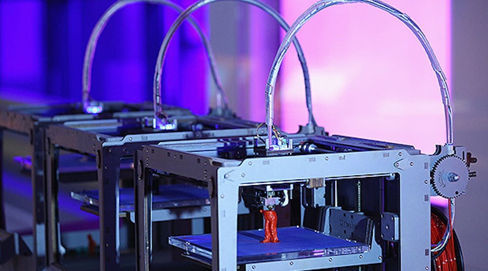 A line of 3-D printers in action.