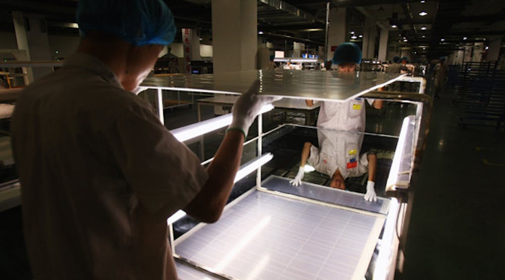 India&apos;s new government reversed its decision to slap anti-dumping duties on solar panel imports from the United States, China (shown in this file photo) and other foreign firms.