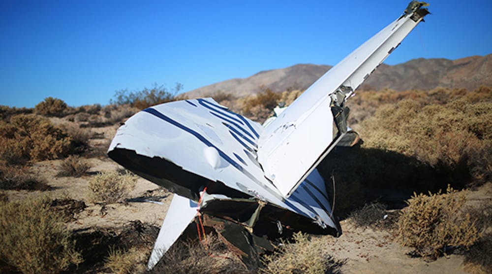 Debris from Virgin Galactic SpaceShip 2 sits in a desert field November 2, 2014 north of Mojave, California on The Virgin Galactic SpaceShip 2 crashed on October 31, 2014 during a test flight, killing one pilot and seriously injuring another.