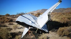 Debris from Virgin Galactic SpaceShip 2 sits in a desert field November 2, 2014 north of Mojave, California on The Virgin Galactic SpaceShip 2 crashed on October 31, 2014 during a test flight, killing one pilot and seriously injuring another.