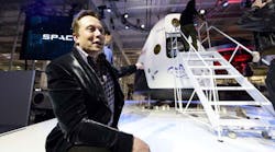 SpaceX CEO Elon Musk unveils the company&apos;s manned spacecraft, The Dragon V2, designed to carry astronauts into space during a news conference on May 29, 2014, in Hawthorne, California. (Photo by Kevork Djansezian/Getty Images)
