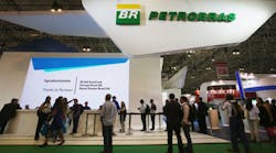 Visitors gather at the Petrobras booth at the Rio Oil &amp; Gas Expo and Conference on September 16, 2014, in Rio de Janeiro. (Photo by Mario Tama/Getty Images)