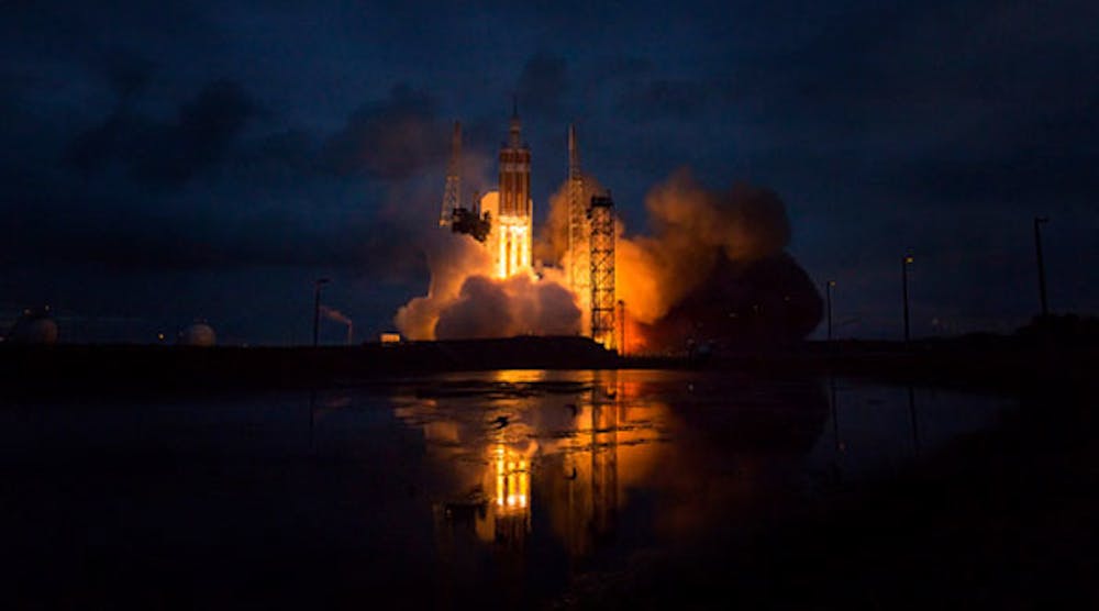 The United Launch Alliance Delta IV Heavy rocket with NASA&apos;s Orion spacecraft mounted atop lifts off from Cape Canaveral Air Force Station&apos;s Space Launch Complex 37 at 7:05 EST this morning. (Photo by Bill Ingalls/NASA via Getty Images)