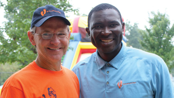 Paul Thompson founder of Transportation Insight with Emmanuel quotMannyquot Ohonme founder of Samaritan39s Feet