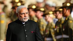 A key survey shows India&apos;s economy is picking up under new Prime Minister Narendra Modi, shown here inspecting the guard at the Parliament House in Canberra, Australia, during a November visit following the 2014 G20 Leaders&apos; Summit.