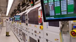 A Boston Scientific technician monitors the automated electrochemical etching process for stent production A Boston Scientific technician monitors the automated electrochemical etching process for stent production