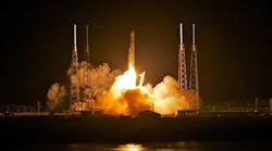 SpaceX&apos;s Dragon spacecraft atop rocket Falcon 9 lifts off from Cape Canaveral Air Force Station in 2012.