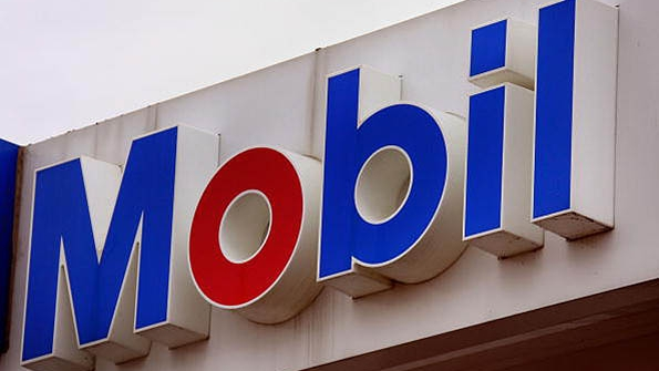 ExxonMobil cuts investment spending in face of lower oil prices