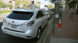 A Google autonomous car parked near the curb